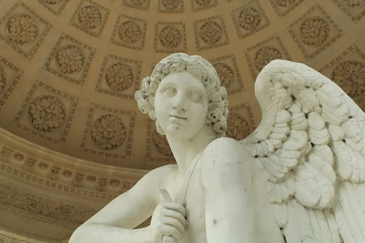 What is the statue inside the Temple of Love?